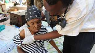 doctor examining patient in Haiti