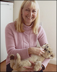 Linda with a lion cub