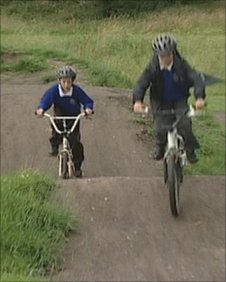 Cyclists using Harraby's new BMX track