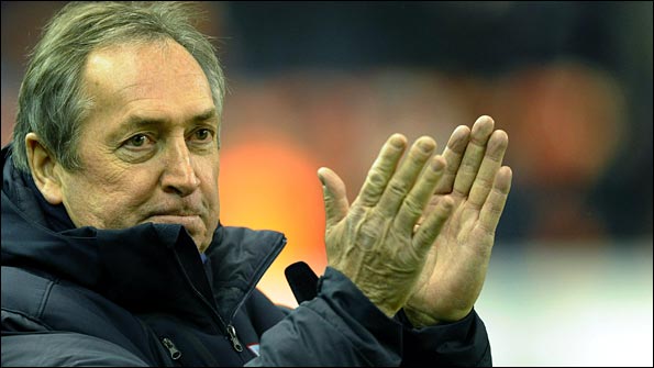 Houllier applauds the Liverpool fans on his return to Anfield. Photo: AFP