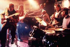 Standing in the Shadows of Motown: (L to R) Funk Brothers Joe Messina on guitar, Jack (Black Jack) Ashford, Johnny Griffith, Joe Hunter, Bob Babbitt on bass, Richard (Pistol) Allen on drums – in Bakers Keyboard Lounge 2000.