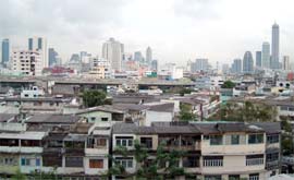 Looking across slums to the skyscrapers of Bangkok