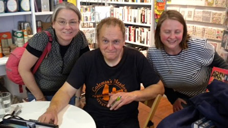 Phil Rickman with fans at a book-signing