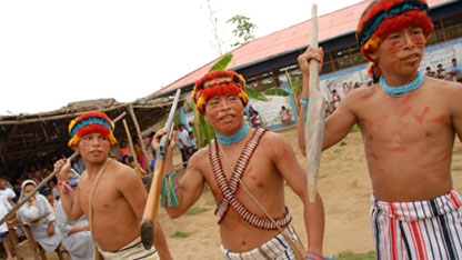 Some of the young Achuar men in Wijing brandish their guns