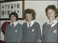 Charles, George and Oscar from the Cotswold School visit Great Rissington church