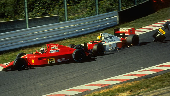 Ayrton Senna crashes into Alain Prost at the start of the 1990 Japanese Grand Prix