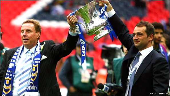Sacha Gaydamak and Harry Redknapp hold aloft the FA Cup