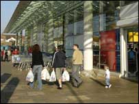 Customers outside supermarket