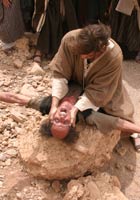 Jesus holds a man down to exorcise him