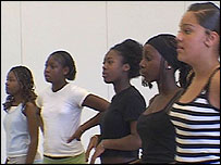 Girls listen keenly in dance workshop