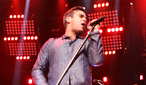 Robbie Williams performs at BBC Electric Proms 2009