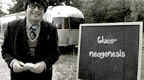 Chris Packham beside blackboard