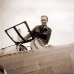 Bryan is seen here in the pilot's escape hatch of a Wellington bomber, at RAF Hereford, during 1944.