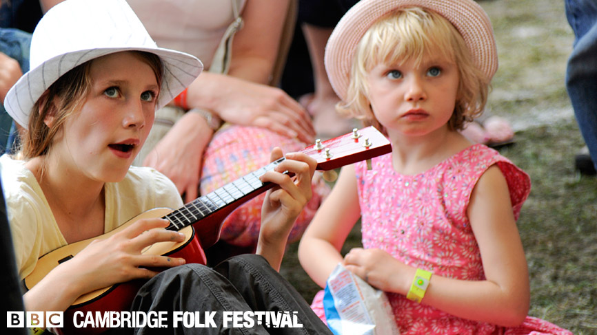 A young fan looks on.
