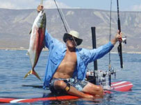 fishing on a longboard