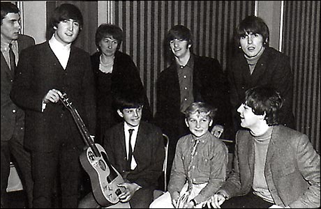 Competition winners receive a signed guitar from The Beatles (Copyright Archant)