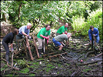 Clearing the main pond at Mickleover Meadows