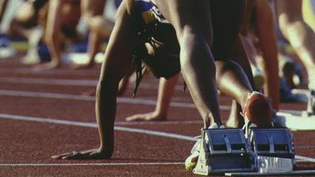 Athlete on starting blocks