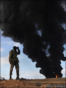 A Libyan rebel on the frontline near Ras Lanuf, Libya (9 March 2011)
