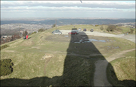 The tower casts a shadow on the Hill