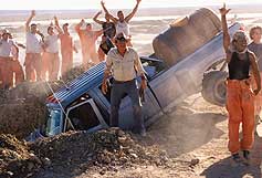 Image: John Voigt as Mr Sir with the boys of Camp Green Lake in Disney's new film, Holes
