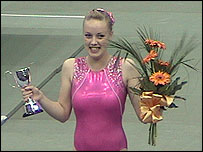 Trampolinist Sophie Burr winning a trophy
