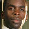 Jimmy Akingbola as Neil Parker
