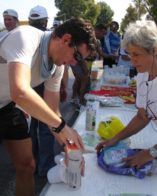 A proper runner: Robin Harvie at a checkpoint along the 245-km route of the Spartathlon