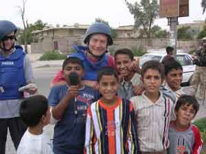 John with some local children