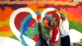 Image of Derry schoolchildren working on a mural