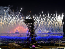 Exterior shot of Olympic Stadium and fireworks during opening ceremony.