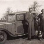 The Austin 10 that we slept in. Notice Rover, the farm dog. Notice too the blackout hoods over the headlights