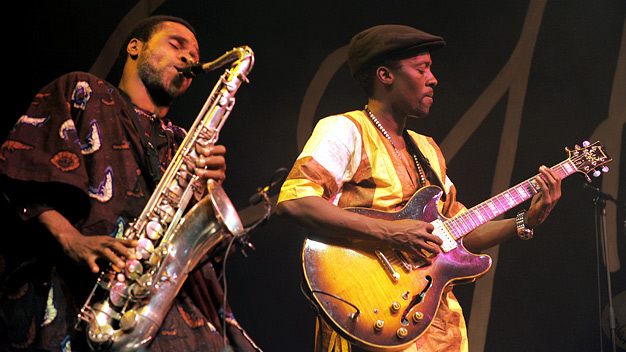 Cheikh Lo and band live at the Old Fruitmarket. Photo by Louis Decarlo.