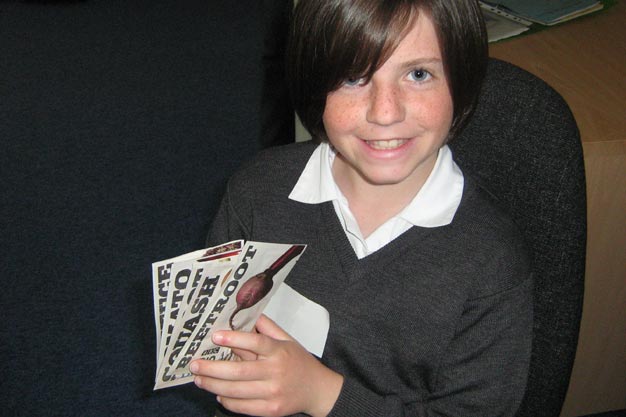 Showing off the seeds we are going to sow