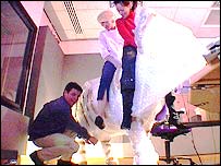 Heather and Nichola ride the cow while Mark looks for the ignition key!