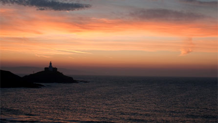 Sunrise over Mumbles lighthouse on October 1 by Tony Buckley.